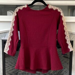 peplum lacey arm top